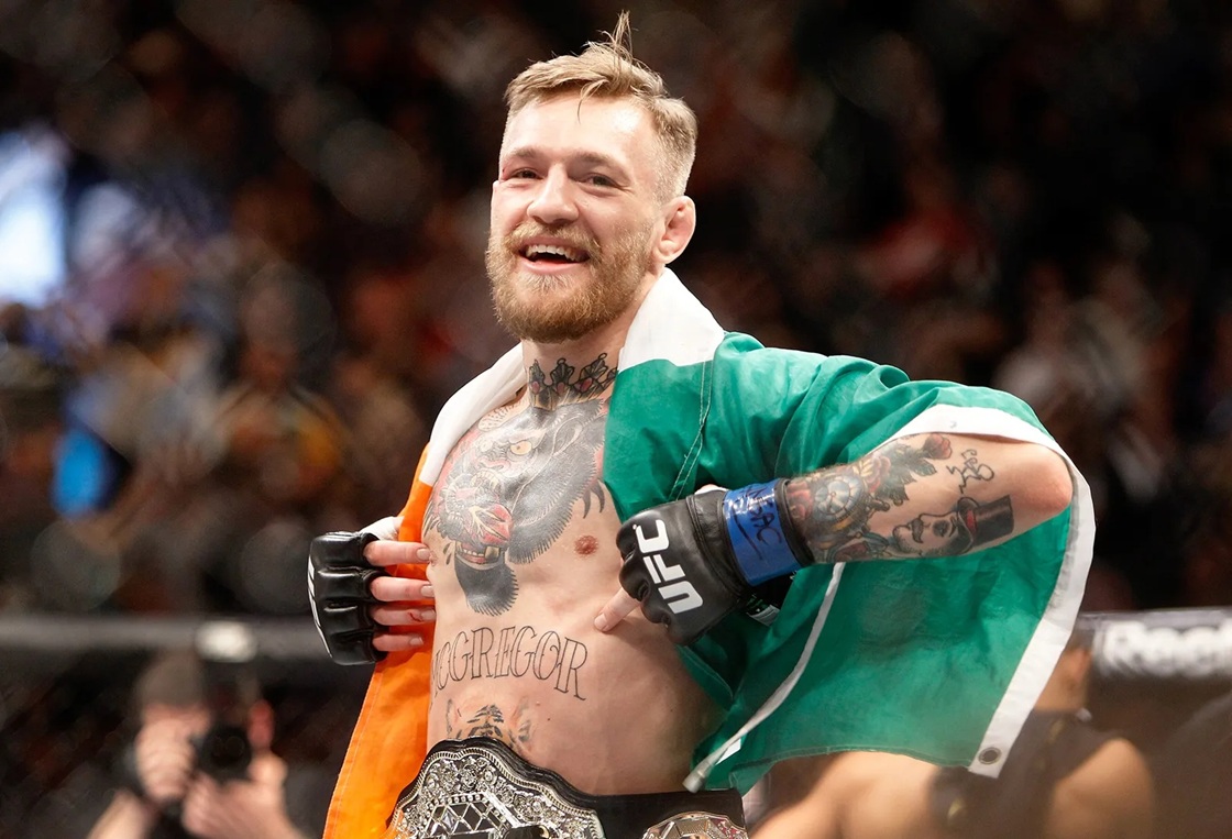 conor-mcgregor-celebrates-first-round-knock-out-victory-over-jose-aldo-in-featherweight-title-ufc-194-2015